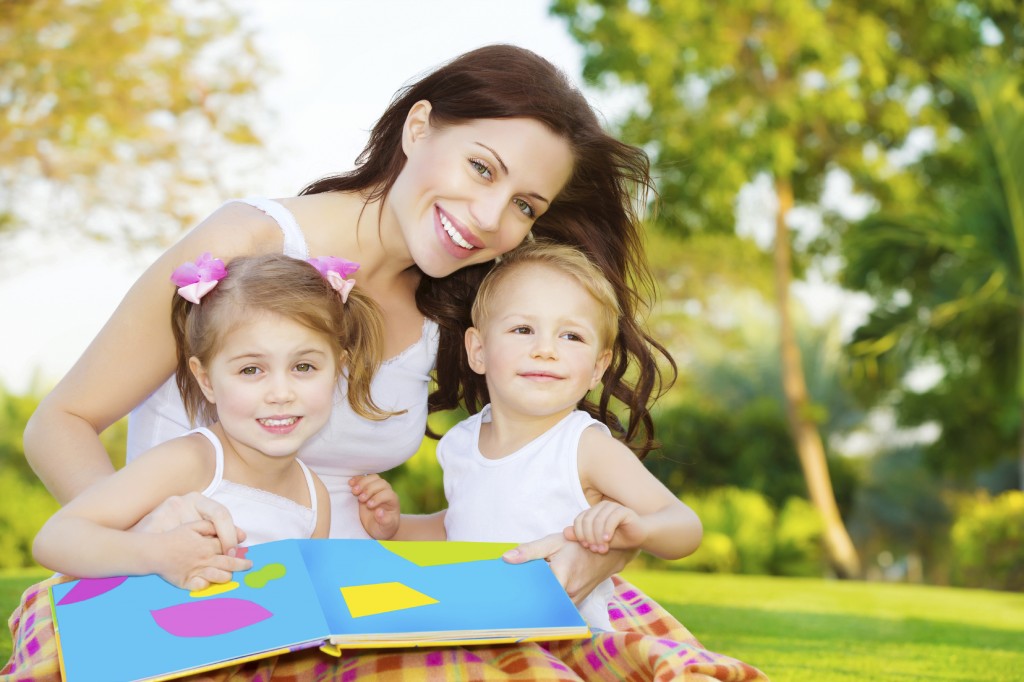 Happy family reading book